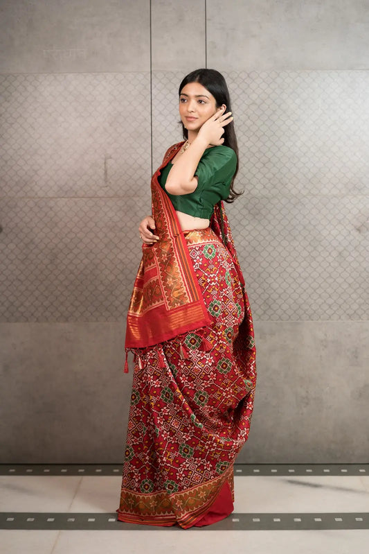 Classic Red Patola Silk Saree with Traditional Woven Border & Tassels