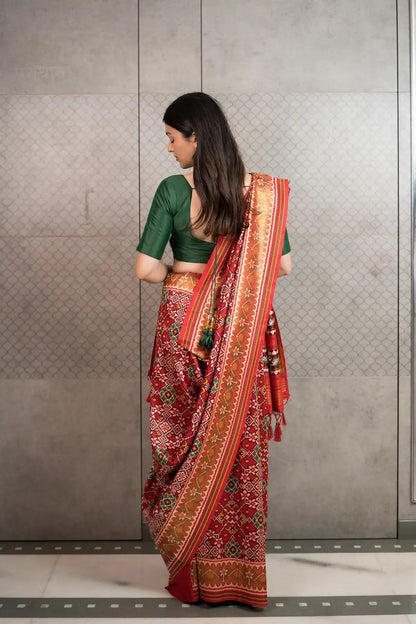 Classic Red Patola Silk Saree with Traditional Woven Border & Tassels