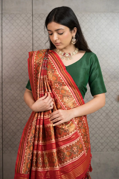 Classic Red Patola Silk Saree with Traditional Woven Border & Tassels