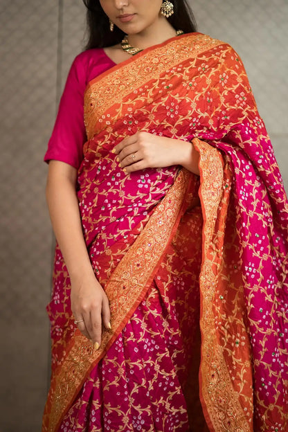 Rani Pink & Orange Bandhani Silk Saree with Handwork & Zari Border