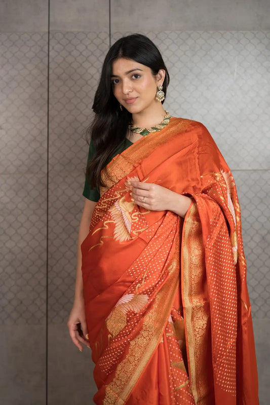 Rust Orange Art Crepe Saree with Fancy Printed Design & Zari Accents