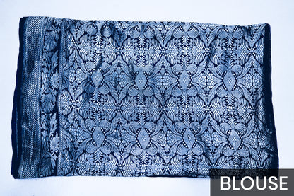 Elegant Blue Satin Silk Saree Featuring Silver Zari and Printed Patterns
