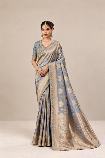 Powder Blue Silk Saree with Golden Floral Weaves & Embellished Border