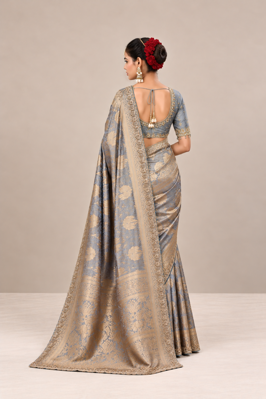 Powder Blue Silk Saree with Golden Floral Weaves & Embellished Border