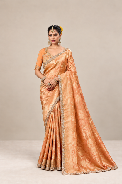 Peach Copper Woven Silk Saree with Intricate Zari Border