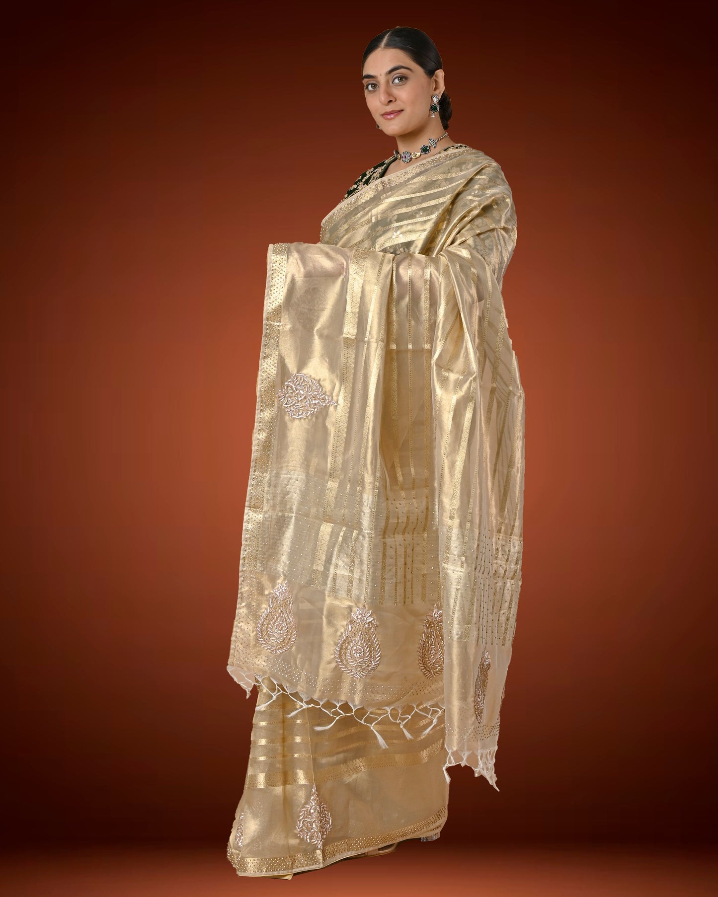 Gold Tissue Silk Saree with Jardosi and Diamond Embellishment & Green Embroidered Blouse