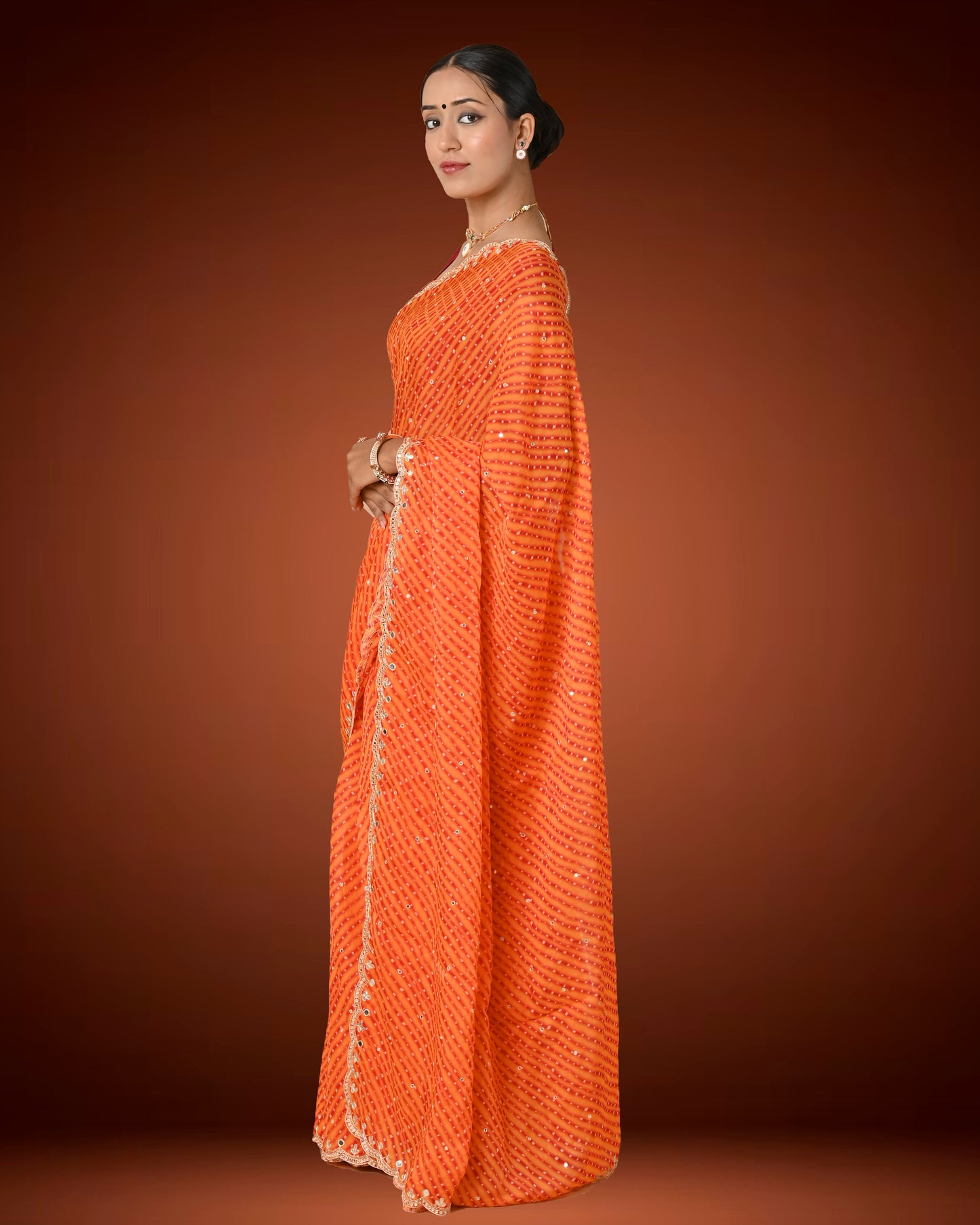 Orange Crape Georgette Leheriya Saree with Mirror Work Border