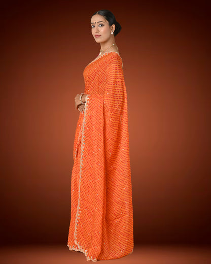 Orange Crape Georgette Leheriya Saree with Mirror Work Border