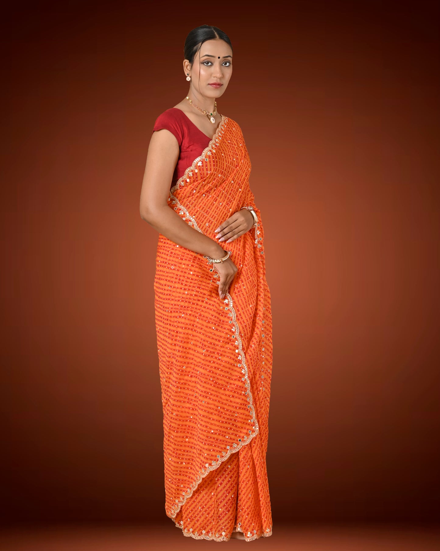 Orange Crape Georgette Leheriya Saree with Mirror Work Border