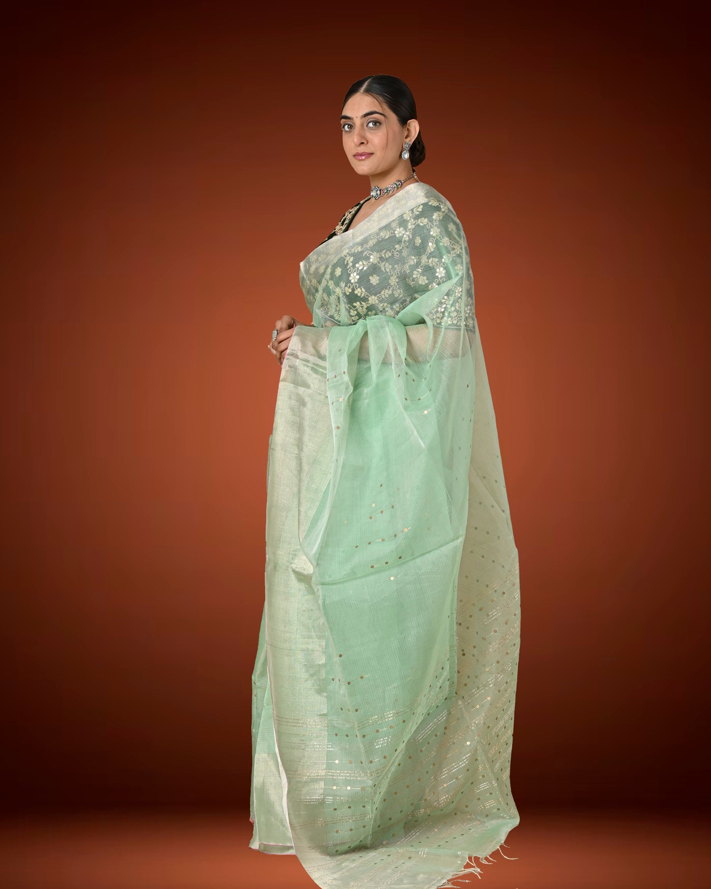 Kosa Silk Saree in Pastel Green with Sequins Woven Pallu & Contrast Dark Blouse