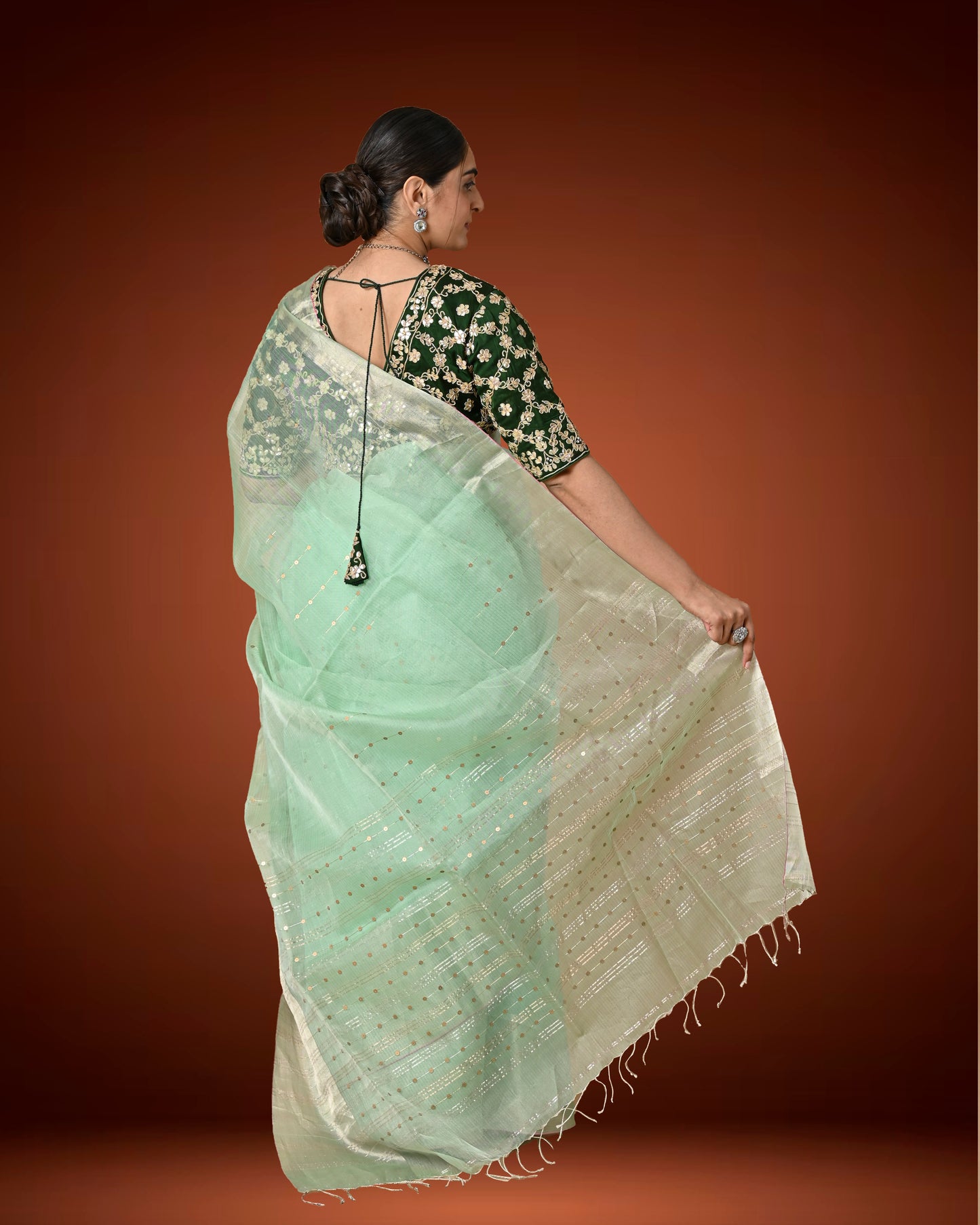 Kosa Silk Saree in Pastel Green with Sequins Woven Pallu & Contrast Dark Blouse