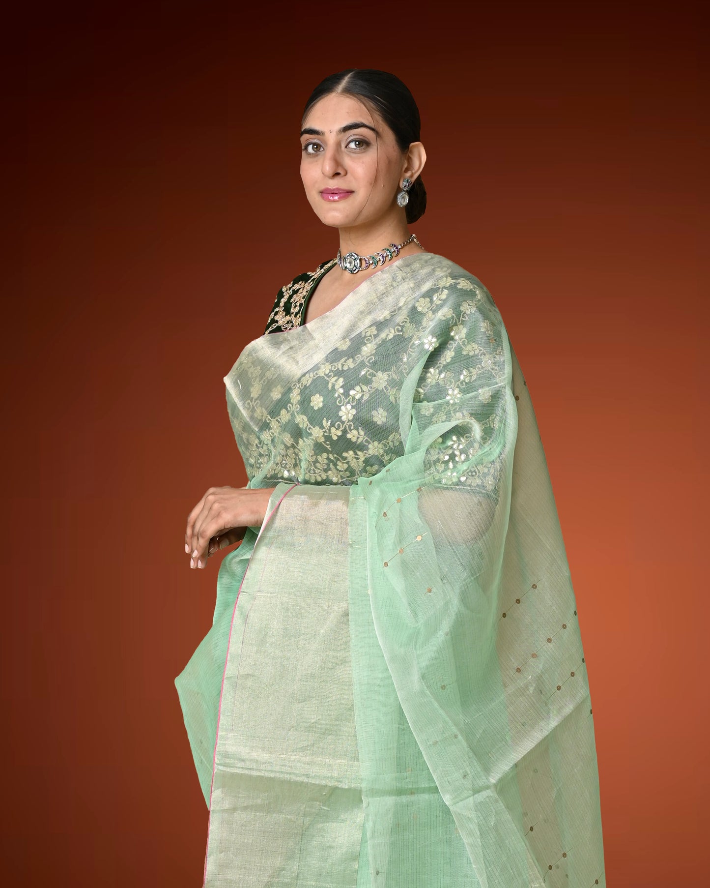 Kosa Silk Saree in Pastel Green with Sequins Woven Pallu & Contrast Dark Blouse