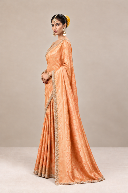 Peach Copper Woven Silk Saree with Intricate Zari Border