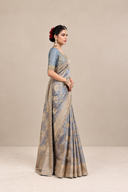 Powder Blue Silk Saree with Golden Floral Weaves & Embellished Border