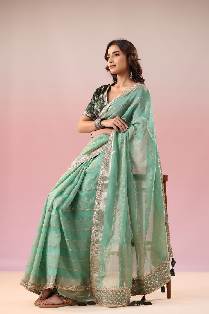 Mint Green Organza Saree With Golden Zari Detailing